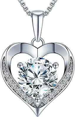 Silver heart-shaped pendant with central diamond.