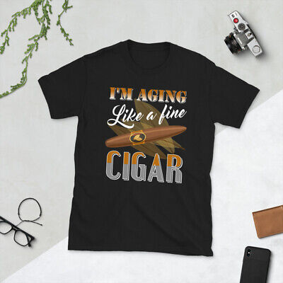 Novelty t-shirt with aging cigar pun design.