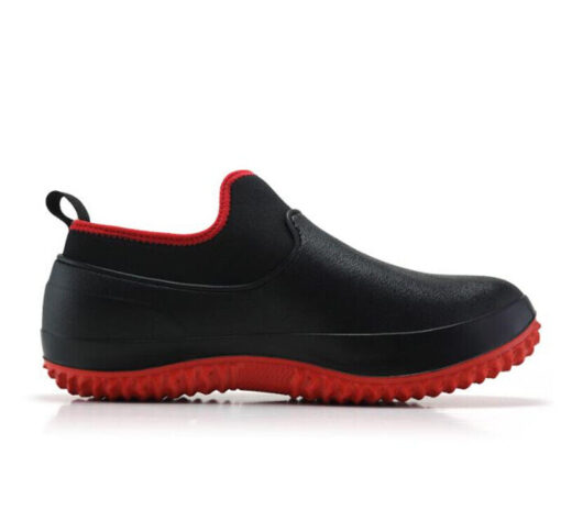 Black slip-on shoe with red sole and trim.