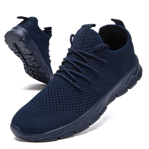 Blue knit running sneakers on white background.