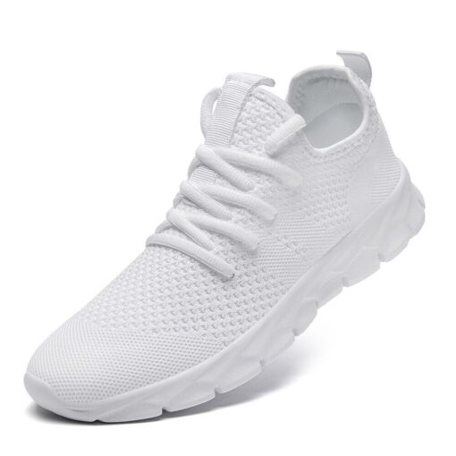 White athletic running shoes on white background