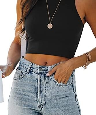 Woman in black crop top and blue jeans.