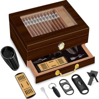 Wooden cigar humidor with accessories.