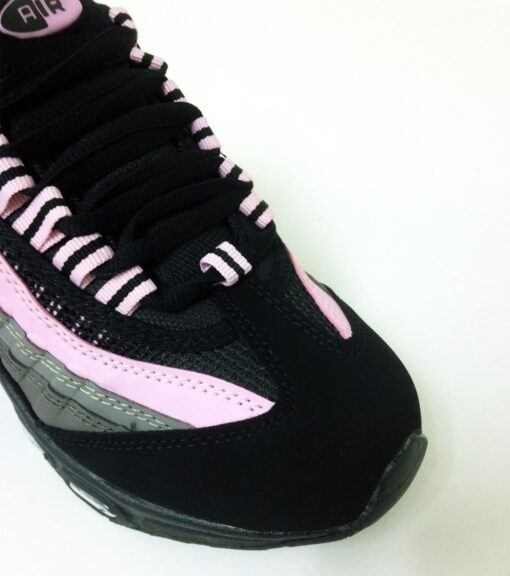 Black and pink sneaker closeup view.