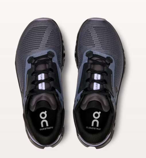 Pair of dark gray running shoes top view.