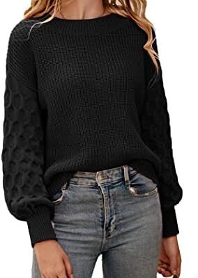 Woman in black sweater and jeans