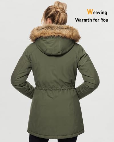Woman in green parka with fur hood, back view.