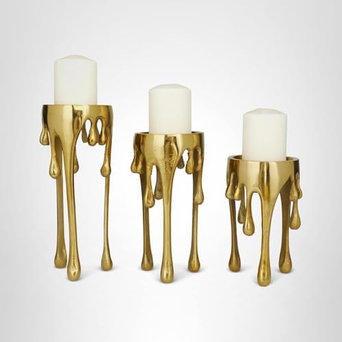 Gold candle holders with white candles