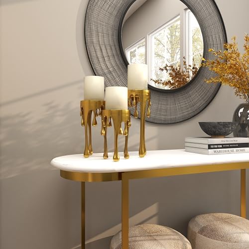 Elegant room with gold candle holders and decor.