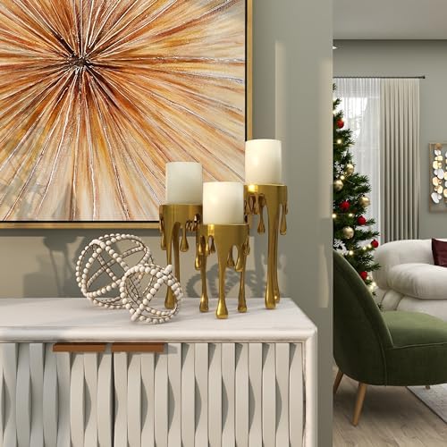 Elegant living room with art and candle decor.