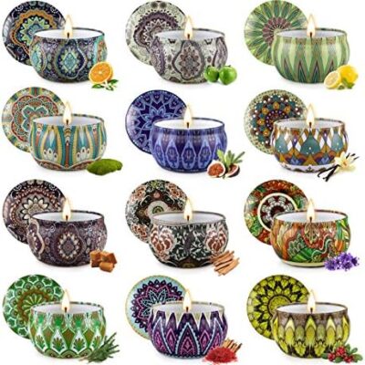 Set of decorative scented candles with lids.